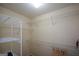 Walk-in closet with wire shelving and a clothing rack at 4511 Ravenwood Pl # 70, Union City, GA 30291