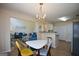 Bright dining area with view of living room and modern decor at 4511 Ravenwood Pl # 70, Union City, GA 30291
