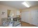 Well-lit kitchen with a breakfast bar, stainless steel appliances, and ample storage space at 4511 Ravenwood Pl # 70, Union City, GA 30291