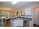 Bright kitchen with stainless steel appliances and breakfast bar, offering convenience and style at 4511 Ravenwood Pl # 70, Union City, GA 30291