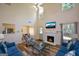 Inviting living room with a fireplace and views into the kitchen, creating a warm and welcoming atmosphere at 4511 Ravenwood Pl # 70, Union City, GA 30291