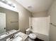 Well-maintained bathroom featuring a vanity with granite countertop and a shower/tub combo at 6861 John Clark Dr, Douglasville, GA 30134