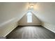 Comfortable bedroom with neutral paint and carpet, featuring a window and recessed lighting at 6861 John Clark Dr, Douglasville, GA 30134