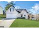 Charming single-Gathering home with a well-maintained lawn and attached two-car garage at 6861 John Clark Dr, Douglasville, GA 30134