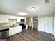 Well-equipped kitchen with stainless steel appliances, granite countertops, and ample cabinet space at 6861 John Clark Dr, Douglasville, GA 30134