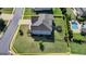 Aerial view of a beautiful home featuring a swimming pool, a yard, and a yellow border at 7575 Old Camp Lndg, Cumming, GA 30040