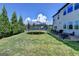 Spacious backyard with a trampoline, patio, and lots of space at 7575 Old Camp Lndg, Cumming, GA 30040