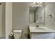 Bathroom featuring a toilet, vanity with a white countertop, and sink at 7575 Old Camp Lndg, Cumming, GA 30040