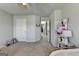 Bedroom featuring a ceiling fan, neutral walls, and carpeted floor at 7575 Old Camp Lndg, Cumming, GA 30040