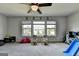 Large bonus room featuring multiple windows and carpeting at 7575 Old Camp Lndg, Cumming, GA 30040