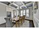 Spacious dining area with hardwood flooring, chandelier lighting, and neutral color palette at 7575 Old Camp Lndg, Cumming, GA 30040