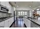 Kitchen flows into dining area creating an open floor plan concept at 7575 Old Camp Lndg, Cumming, GA 30040