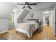 Upstairs bedroom with hardwood floors, window and neutral colors at 1680 Huntington Dr, Marietta, GA 30066
