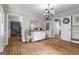 Bright dining area with hardwood floors, decorative chandelier, and stylish decor at 1680 Huntington Dr, Marietta, GA 30066