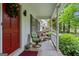 Cozy front porch featuring comfortable seating, creating an inviting outdoor space for relaxation at 1680 Huntington Dr, Marietta, GA 30066