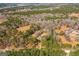 Aerial view of property surrounded by trees at 3725 Concord Rd, Newborn, GA 30056