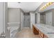 Bright bathroom with a soaking tub, walk-in shower, and a vanity with granite countertops at 3725 Concord Rd, Newborn, GA 30056