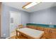 Dining room with cabinets, a large table, and access to the laundry room at 3725 Concord Rd, Newborn, GA 30056