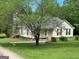 Attractive single-Gathering home with covered porch, situated on a well-manicured lot at 3725 Concord Rd, Newborn, GA 30056