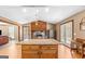 Kitchen with island, granite countertops, stainless appliances, and access to the backyard at 3725 Concord Rd, Newborn, GA 30056