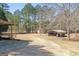 Property features multiple sheds and carports, ideal for storage and hobbies at 3725 Concord Rd, Newborn, GA 30056