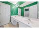 Bathroom with double vanity, white cabinets, and a walk-in shower at 2967 Albright Commons, Kennesaw, GA 30144