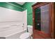 Cozy bathroom featuring a tub/shower combination and a dark wood storage cabinet at 2967 Albright Commons, Kennesaw, GA 30144