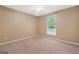 Neutral-toned bedroom with carpet and a window providing natural light at 2967 Albright Commons, Kennesaw, GA 30144