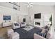 Bright living room with vaulted ceiling, fireplace, hardwood floors, and comfortable seating area at 2967 Albright Commons, Kennesaw, GA 30144