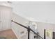 Carpeted staircase leading to living area below with abundant natural light at 2967 Albright Commons, Kennesaw, GA 30144