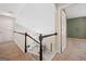 Carpeted staircase leading to living area below at 2967 Albright Commons, Kennesaw, GA 30144