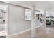 Open basement area featuring tile floors, a living area, and kitchenette at 5875 Highway 92, Fairburn, GA 30213