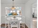 Cozy dining area featuring a round table and views to the living room at 5875 Highway 92, Fairburn, GA 30213