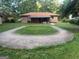 Expansive backyard featuring a covered patio and generous green space, perfect for outdoor enjoyment at 8145 Attleboro Dr, Jonesboro, GA 30238
