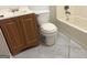 Bathroom features tile flooring, vanity and toilet at 8145 Attleboro Dr, Jonesboro, GA 30238
