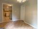 Room featuring tile flooring and view into the kitchen at 8145 Attleboro Dr, Jonesboro, GA 30238