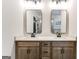 Stylish bathroom vanity featuring double sinks, quartz countertop, and modern black fixtures at 980 Temple Draketown Rd, Temple, GA 30179