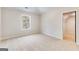 Neutral bedroom with carpet, a window letting in natural light, and a closet at 980 Temple Draketown Rd, Temple, GA 30179
