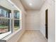 Walk-in closet with shelving, large windows, and neutral carpet providing ample storage space at 980 Temple Draketown Rd, Temple, GA 30179