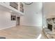 Expansive living room featuring a stone fireplace, wood flooring, and high ceilings at 980 Temple Draketown Rd, Temple, GA 30179