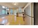 Well-lit kitchen features stainless steel appliances and an eat-in area with access to the backyard at 2001 Fairbrook Ln, Woodstock, GA 30189