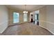 Bright living room with large windows and neutral carpet at 2001 Fairbrook Ln, Woodstock, GA 30189