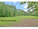 Scenic golf course view behind home offers a picturesque backdrop and convenient access for golf enthusiasts at 302 Welton Way, Peachtree City, GA 30269