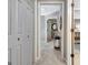 Neutral hallway with closet and views into the bathroom and bedroom at 302 Welton Way, Peachtree City, GA 30269