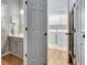 Bathroom with adjoining laundry room and new washer/dryer at 302 Welton Way, Peachtree City, GA 30269