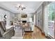 Spacious living room featuring hardwood floors, fireplace, and stylish decor at 302 Welton Way, Peachtree City, GA 30269