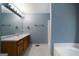 A light and airy bathroom featuring modern fixtures and finishes at 142 Pebblebrook Way, Temple, GA 30179