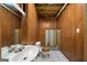 Unfinished bathroom features wood paneling and basic fixtures ready to be customized at 142 Pebblebrook Way, Temple, GA 30179