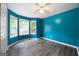 Bright bedroom with vinyl flooring, ample light, and neutral walls at 142 Pebblebrook Way, Temple, GA 30179