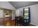 Comfortable dining space with view to kitchen and access to the backyard at 40 Salem Ct, Mcdonough, GA 30252